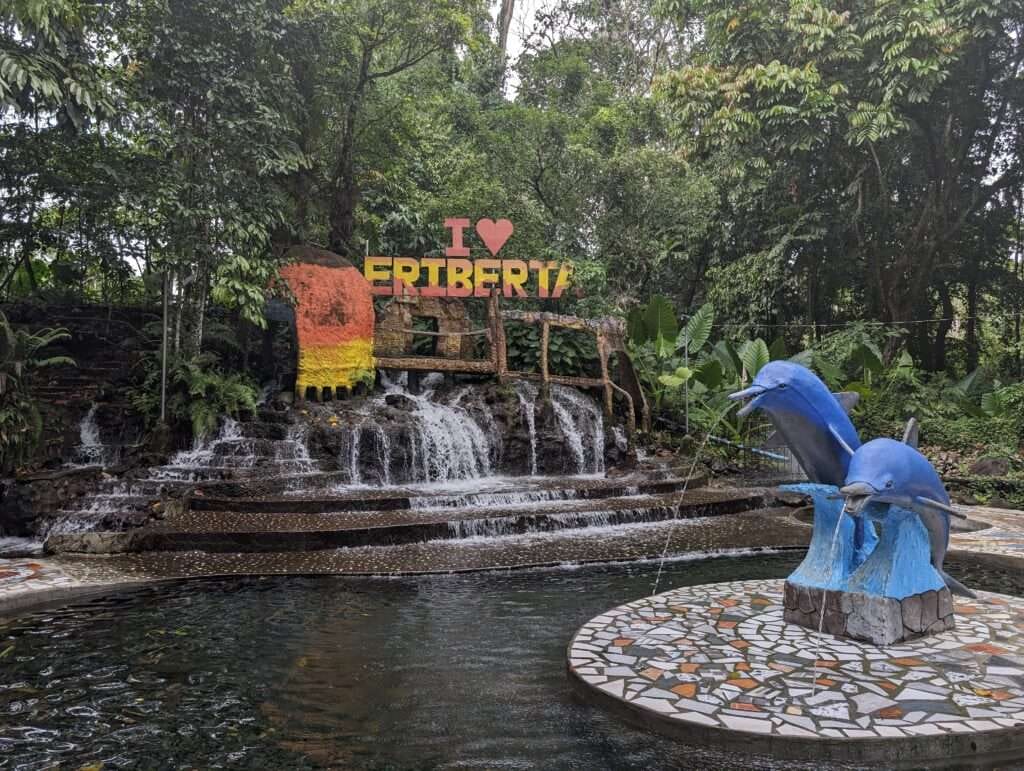 Dive into The Eriberta Spring Resort Of Mahayag, Philippines 1 I love Eriberta Spring Resort signage and dolphin fountain