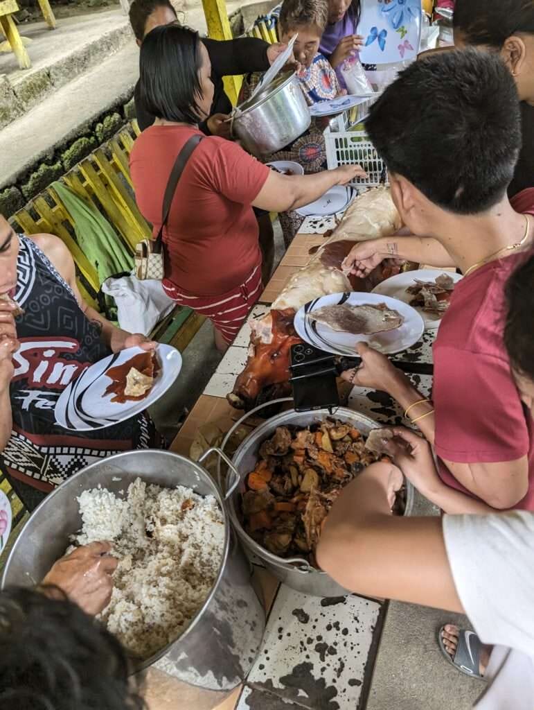 Dive into The Eriberta Spring Resort Of Mahayag, Philippines 5 Lechon being served to celebrate a birthday at the Eriberta water park.